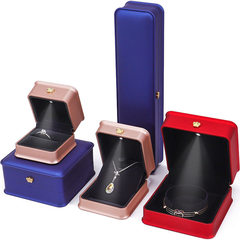 Customizable Glossy Plastic LED Lighted Up Jewelry Box With Golden Crown Ornament