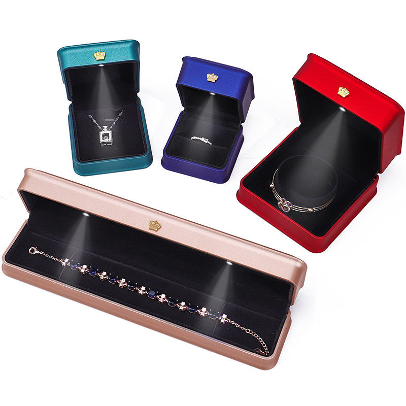 Customizable Glossy Plastic LED Lighted Up Jewelry Box With Golden Crown Ornament