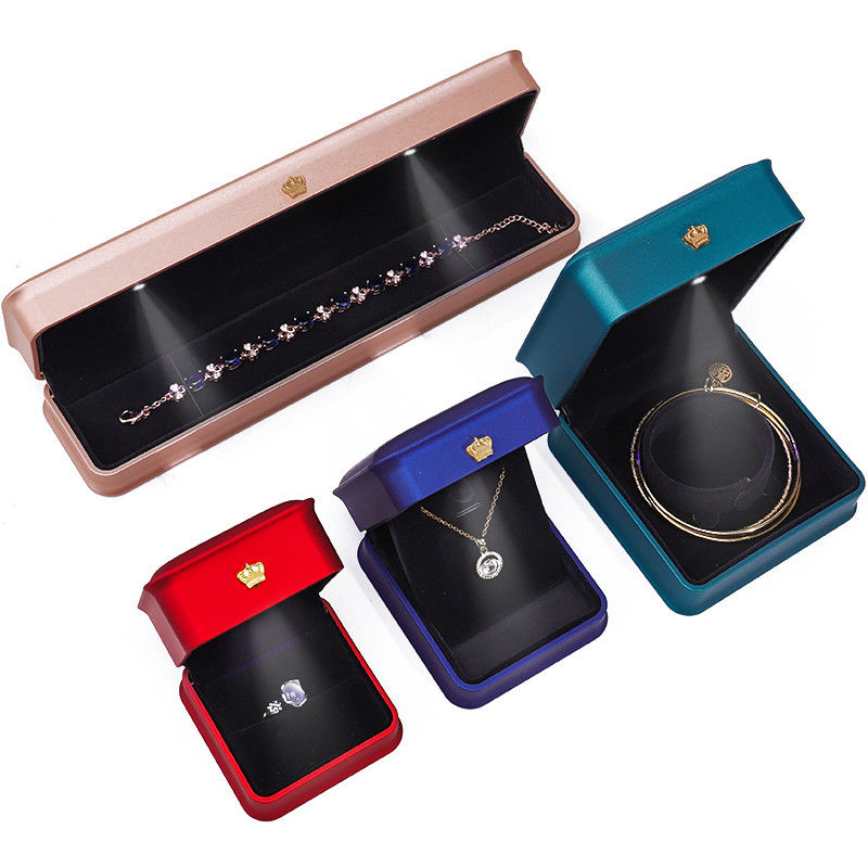 Customizable Glossy Plastic LED Lighted Up Jewelry Box With Golden Crown Ornament